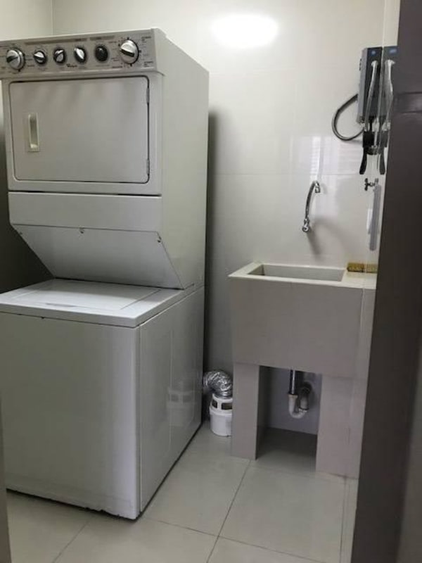 Laundry room with washer, dryer, heater at PH BICSA Avenida Balboa Panama City