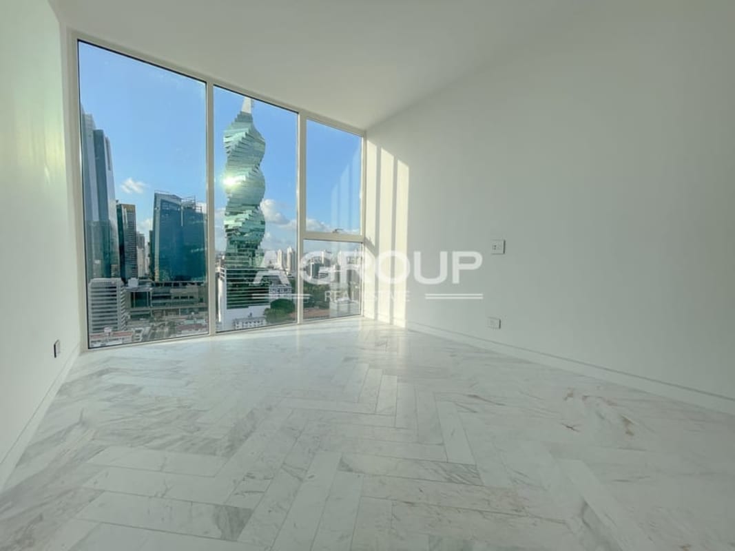 Contemporary European kitchen with marble accents and large sliding doors in PH Wanders & Yoo Panama City