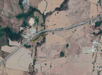 Aerial photography of rural Penonomé land with paved road frontage and surrounding open areas for sale Panama