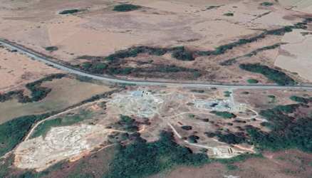 Overview of undeveloped land with dirt roads and adjacent highway perfect for commercial or industrial project in Penonomé Panama