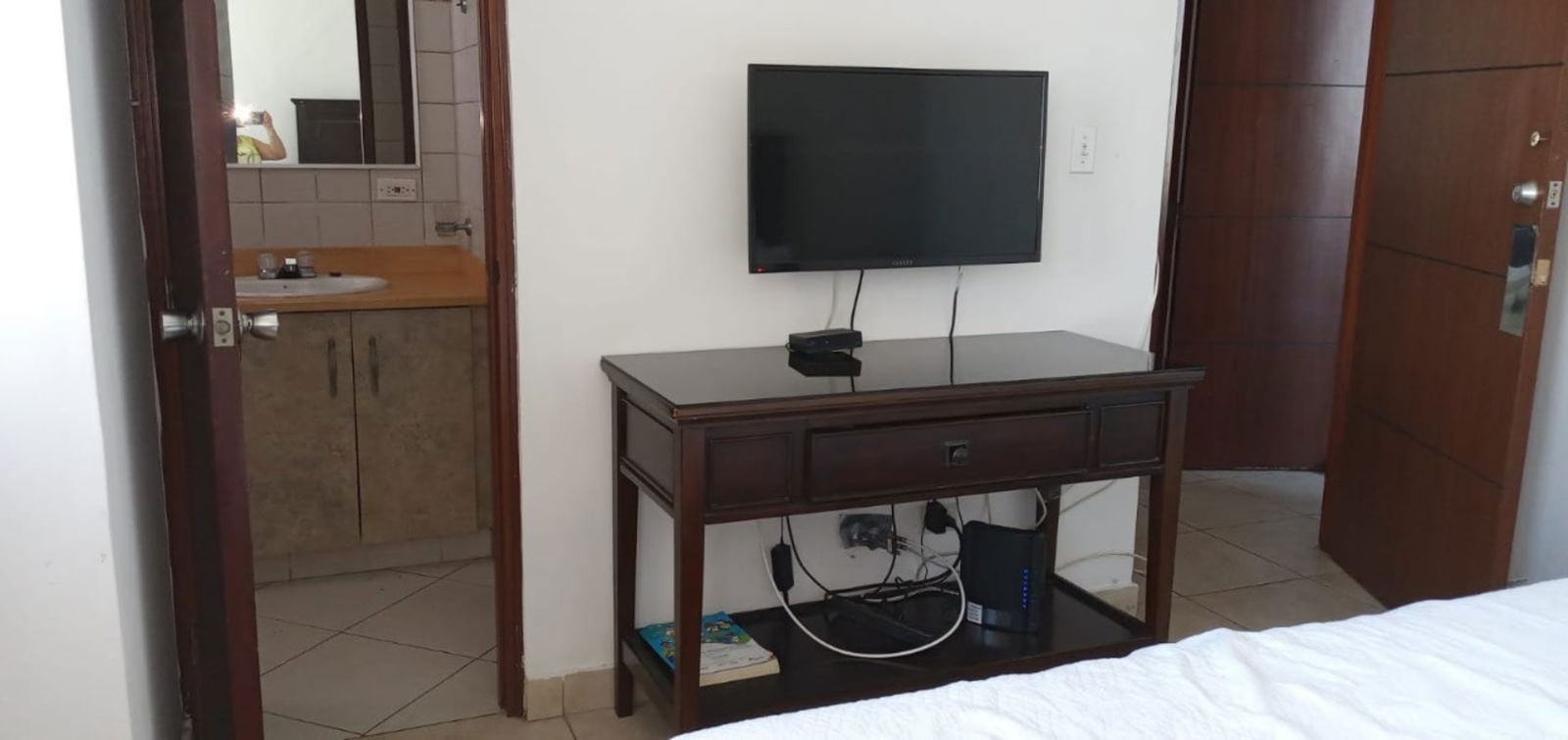 Ceramic tile bathroom with shower vanity PH El Cangrejo Central Apartment Panama City