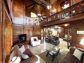 Rustic spacious living area with vaulted wood ceiling, lots of light in Brisas de los Lagos Panama