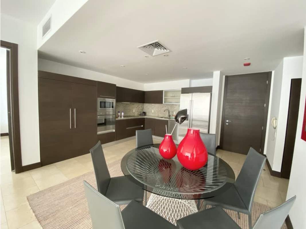 Spacious bathroom with glass shower and marble countertop at The Ocean Club Punta Pacifica Panama