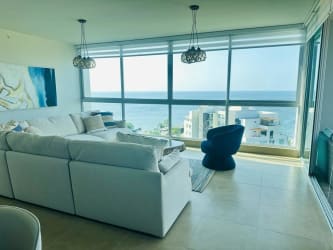 Spacious master suite with king bed, ocean view balcony Riomar San Carlos