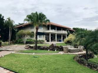Swimming pool and landscaped garden of luxury beachfront estate in Río Hato Panama