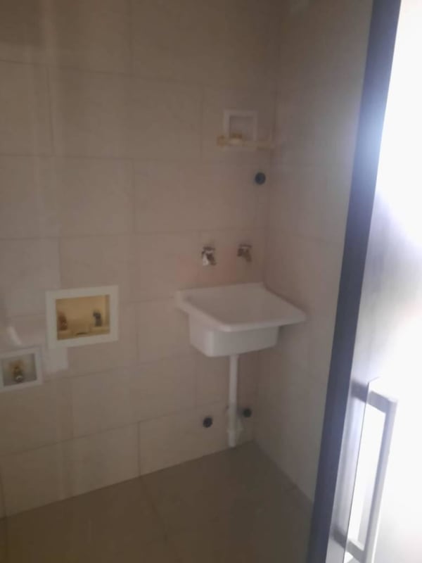 Bright modern kitchen with new fridge and stove in PH El Carmen apartment Panama