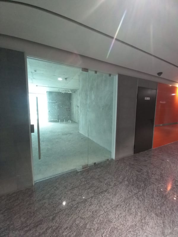 Raw open commercial office core shell space with floor-to-ceiling windows Costa del Este Panama
