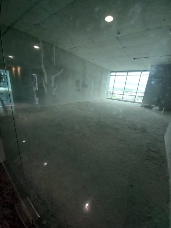 Grey shell space large glass facade unfinished real estate opportunity Santa Maria Business Tower Panama