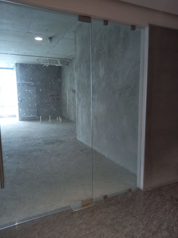 Unfinished office floor open plan concrete walls windows Santa Maria Business District Panama
