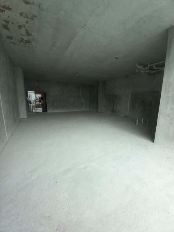 Raw commercial unit interior with panoramic glass facade in business district Panama City