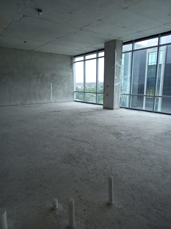Empty corporate office space with full-height windows in Santa Maria Business District Costa del Este Panama
