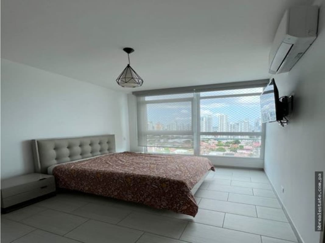 Second bedroom with blue wall AC unit city views PH The Towers Punta Pacifica