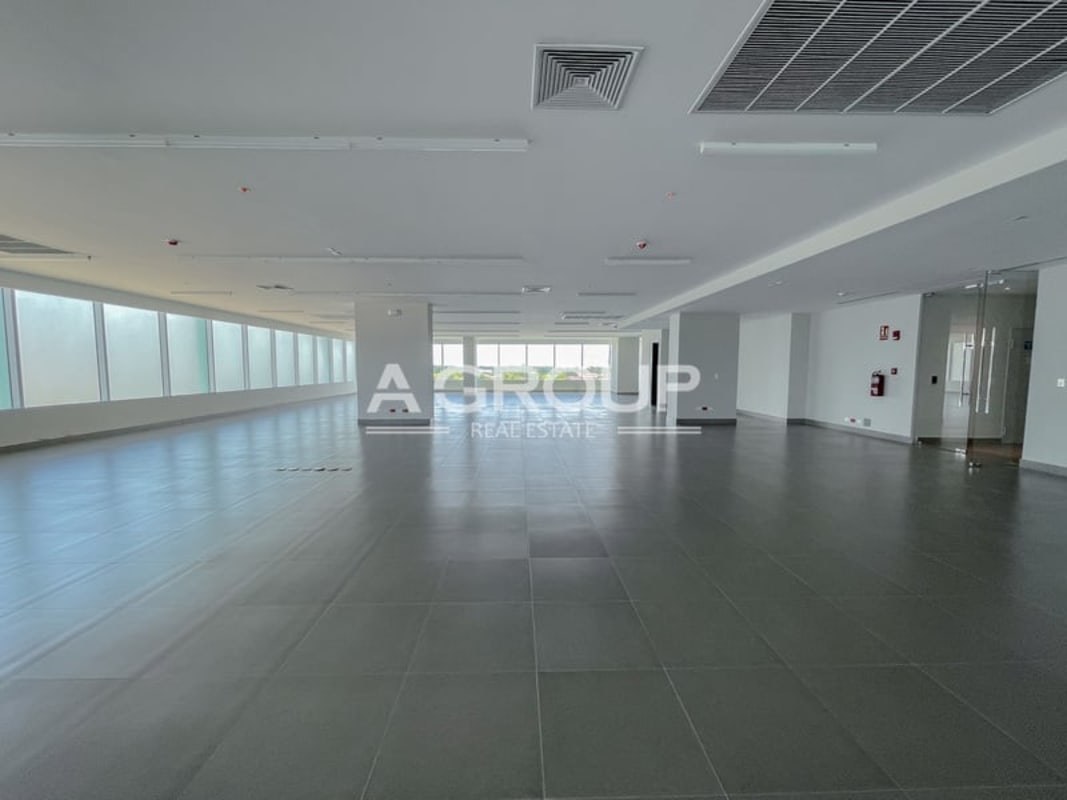 Open commercial office space with panoramic windows at Torre Argos Santa Maria Panama