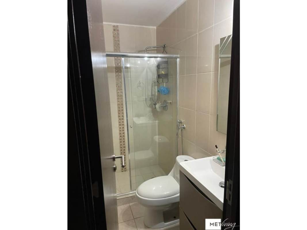 Contemporary bathroom with glass shower, vanity, beige tiles PH Met Village Panama