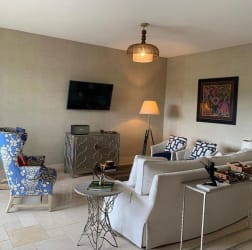 Modern open kitchen with island and living area furnished in Buenaventura Panama