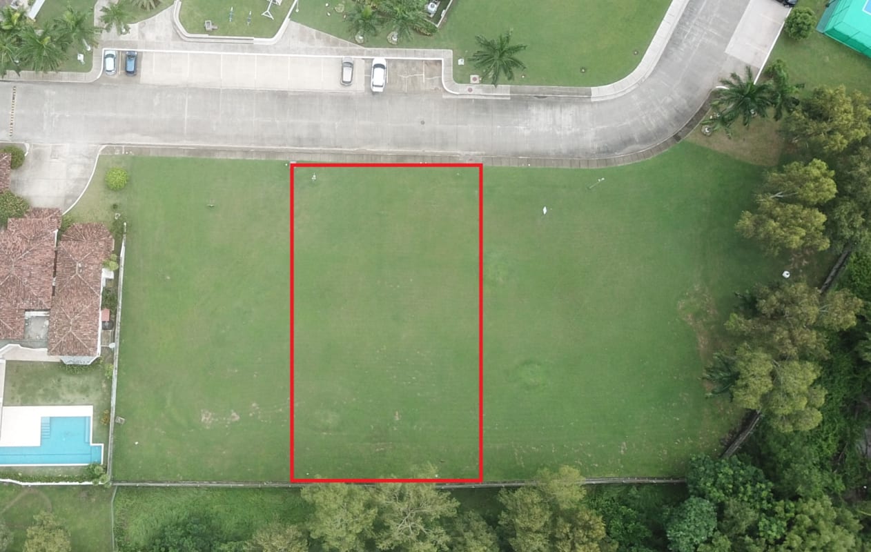 Aerial view of empty residential lot outlined in red Costa del Este Panama