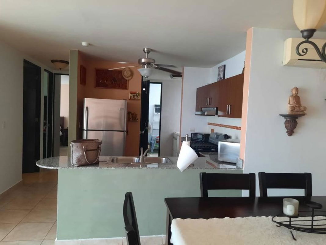 Contemporary kitchen with stainless steel appliances and granite counters PH El Cangrejo