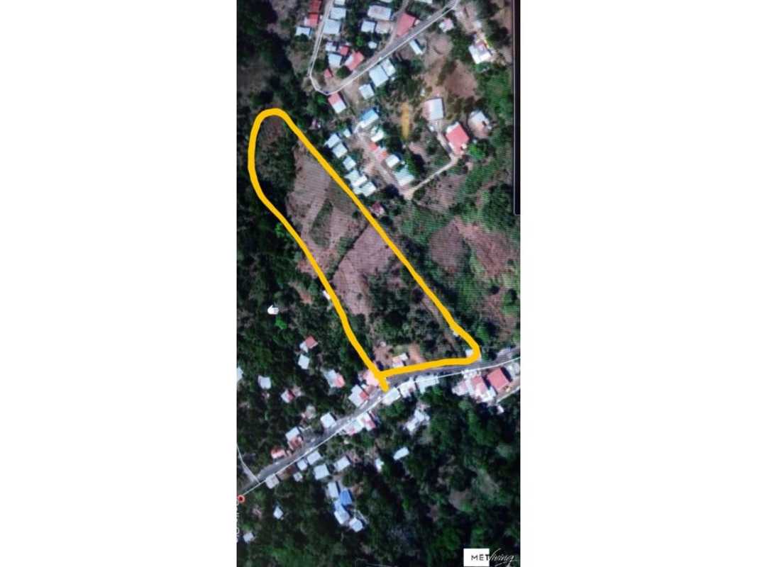 Aerial suburban view of outlined 12 hectares land plot with residential buildings near Alcalde Díaz Panama
