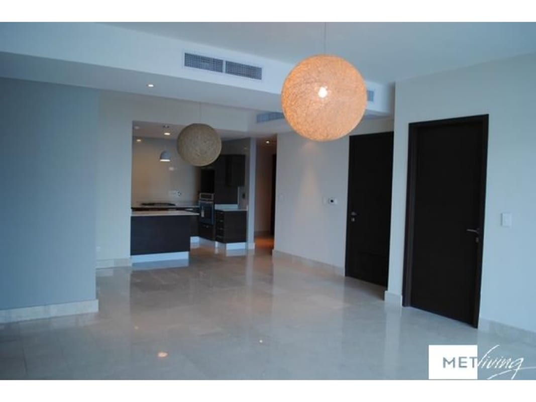 Modern bathroom with double sink vanity, glass shower in Grand Tower Punta Pacifica rental apartment