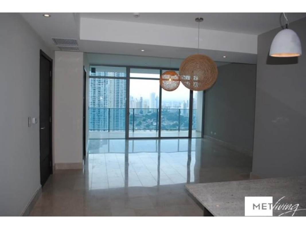 Second bedroom with large window, closet, and marble floors at Grand Tower Punta Pacifica Panama