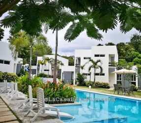 Open dining area with views to terrace in furnished beach townhouse Las Lajas Panama