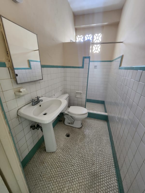 Bright hallway with tiled floors and access to bathroom PH Nova Tower El Cangrejo Panama