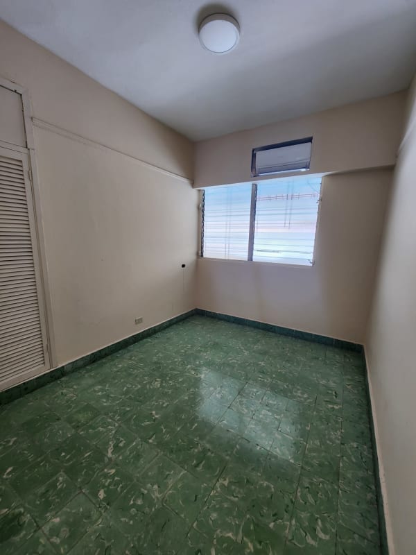 Multi-purpose room with closet and green tile floor PH Nova Tower El Cangrejo Panama City