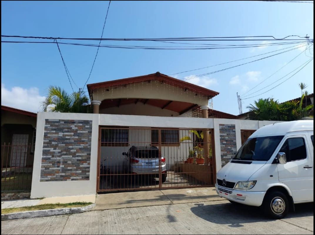 Driveway with gate and covered carport house Brisas del Golf Panama City