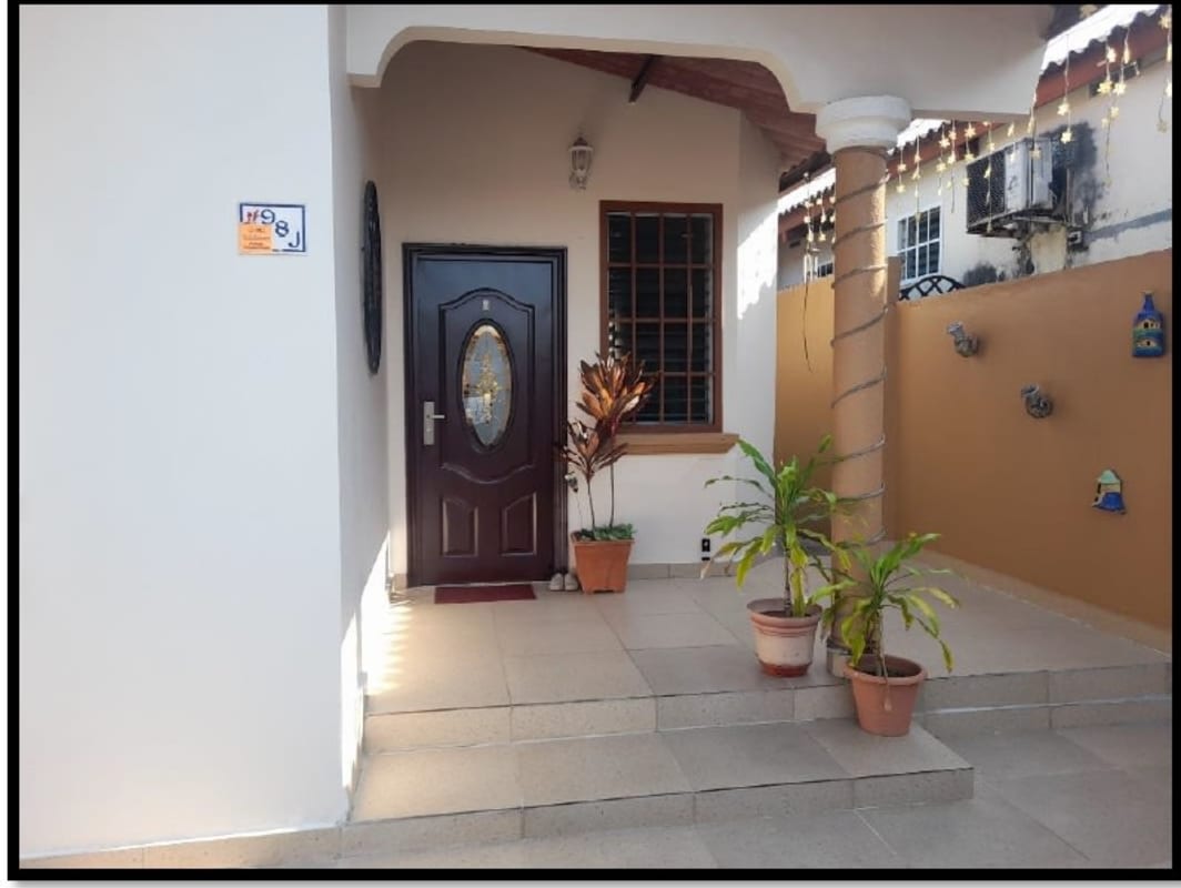 Large rear tiled terrace with plants for sale house Brisas del Golf Panama