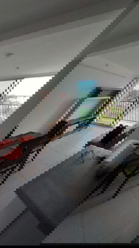 Modern living and dining area opening to balcony with city views in PH Ilo Chanis Panama