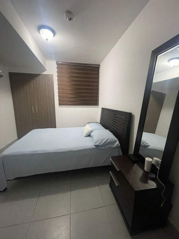 Dining space with balcony access city views PH Ilo by Taurus Panama City