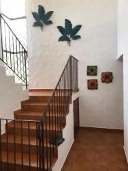 Mediterranean style facade with tile roof, large driveway, palm trees Punta Barco Viejo Panama