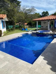 Large pool with hot tub, garden lounge area luxury Punta Barco beach estate Panama