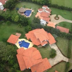 Interior staircase with terracotta tiles and wrought iron railings Punta Barco Estate Panama