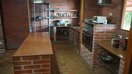 Covered terrace with hammocks and panoramic ocean view in Bucaro Los Santos beachfront lodge