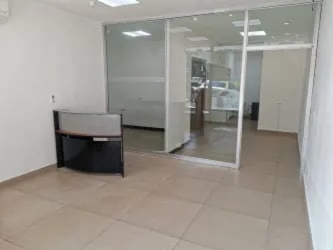 Glass-enclosed meeting room with cabinets PH Parque Mar Panama City