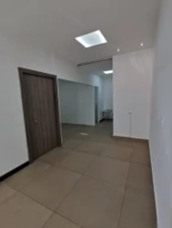 Waiting room with porcelain tiles and glass divisions PH Parque Mar Punta Paitilla Panama