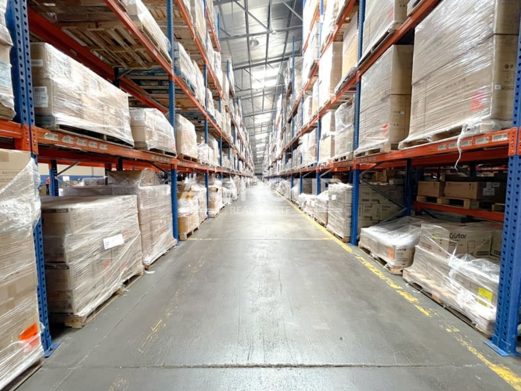 Spacious industrial warehouse storage racks filled with palletized goods Tumba Muerto Panama