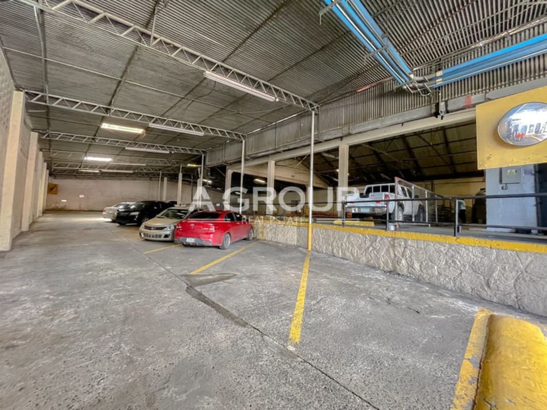 Spacious garage area connected to warehouse with indoor parking at industrial property Tumba Muerto Panama
