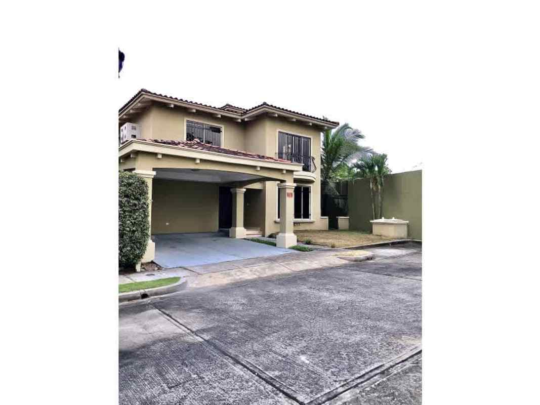 Contemporary spacious living room with sectional sofa and open staircase in PH Paseo Dorado