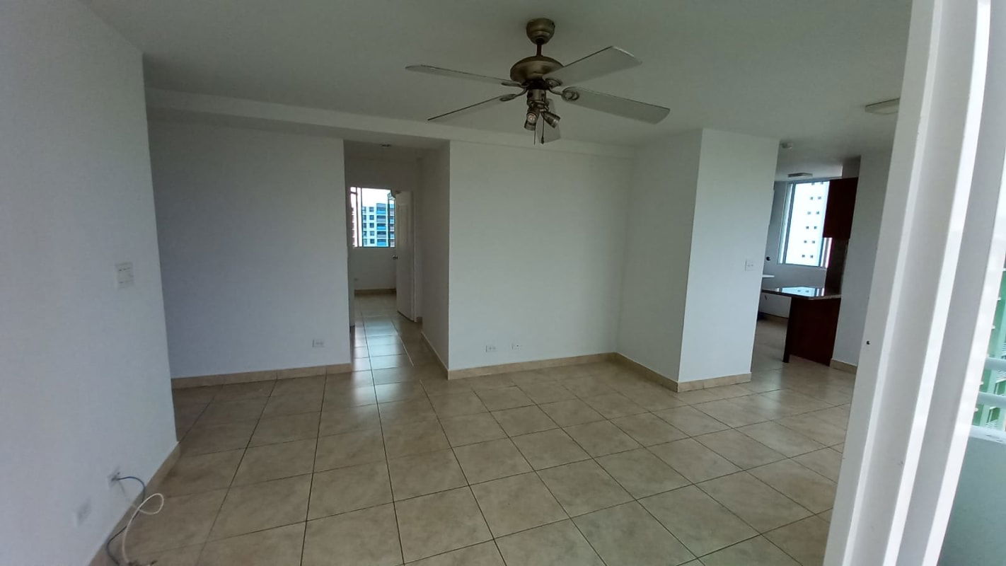 Bedroom with tile flooring, wardrobe and large window at Condado del Rey PH Green Bay Panama