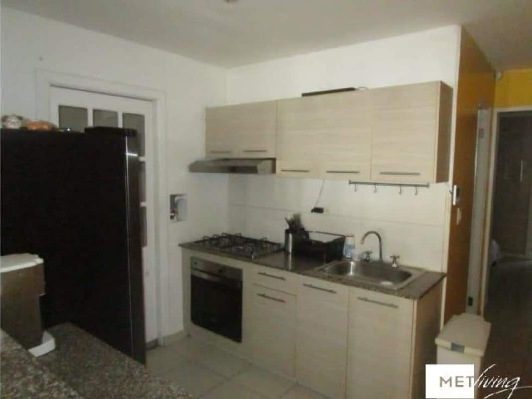 Creative workspace studio with desk shelving Islas Montelimar house for sale Panama