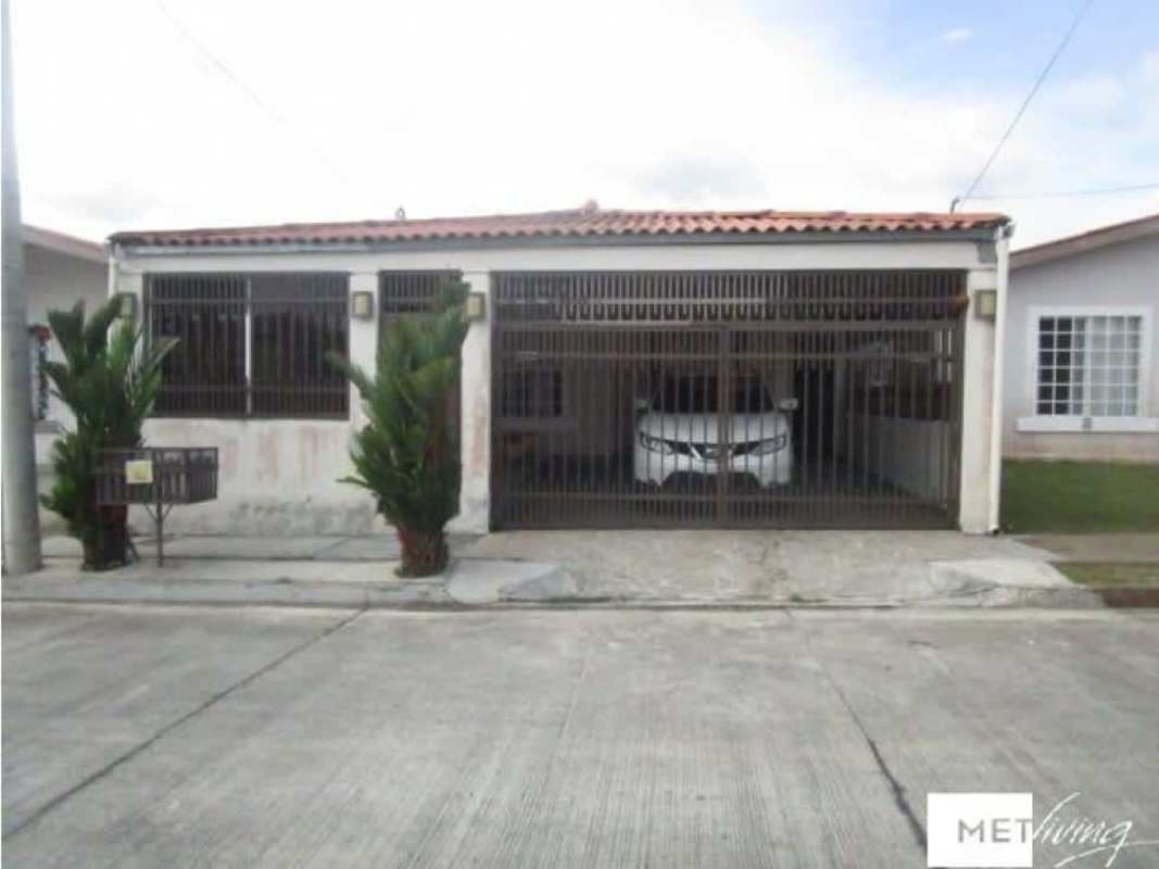 Exterior front of single story house with gated parking in Islas Montelimar La Chorrera Panama