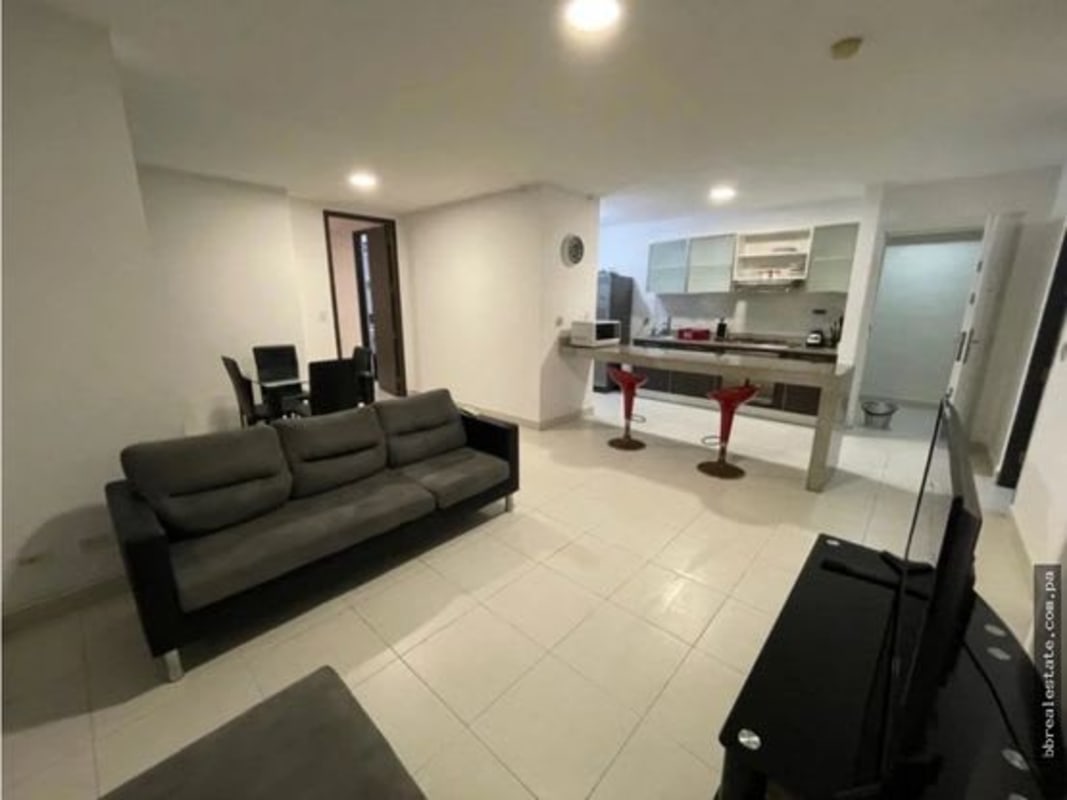 Open living and dining room with balcony access PH Miró El Cangrejo Panama