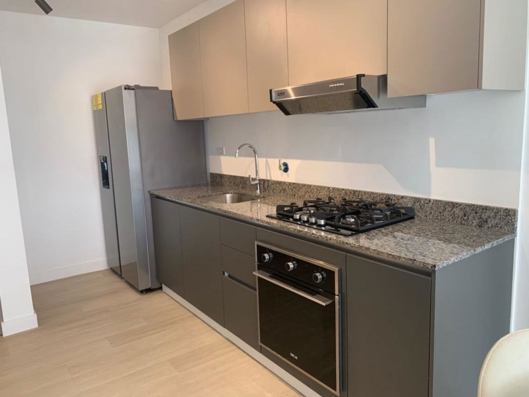 Rooftop infinity pool with jacuzzi and skyline views at PH Quatrium