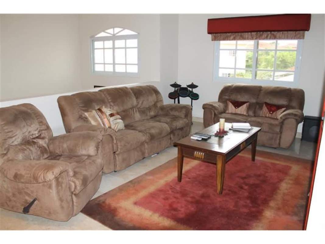 Bright home office with large windows, wood desk Costa del Este Panama