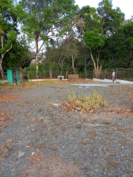 Rustic driveway area with trees around the residential lot for sale in Coclé Panama