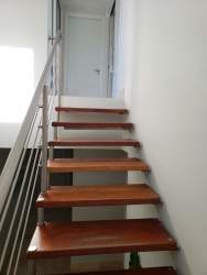 Contemporary kitchen fully equipped with island and modern appliances in Puntarena Buenaventura