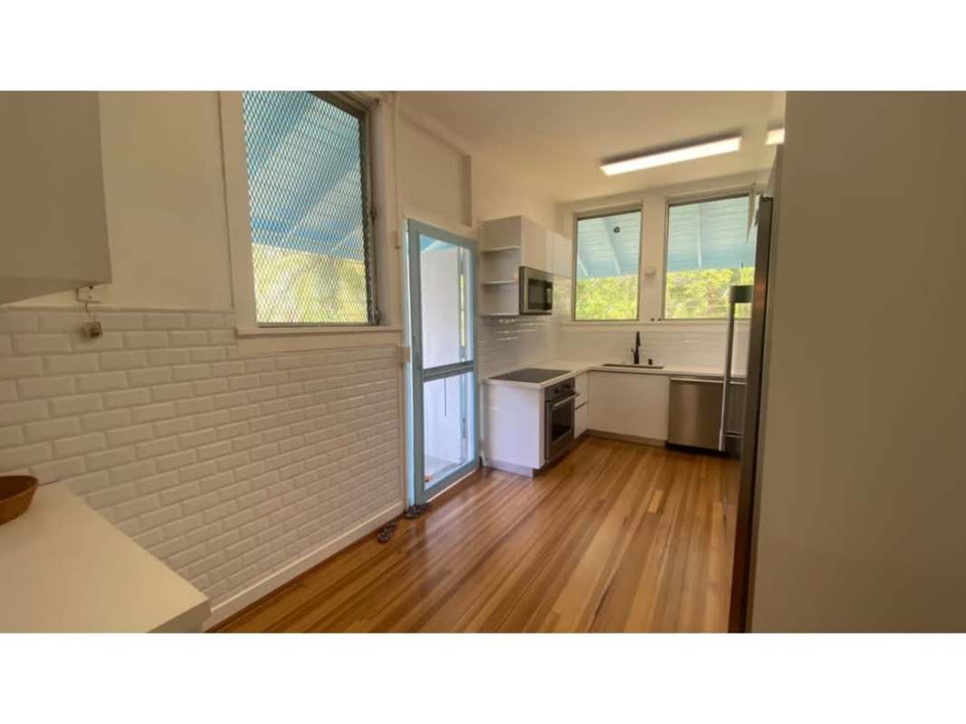 Restored wooden floors large living room with pine ceiling remodeled canal zone house Corozal Ancon Panama