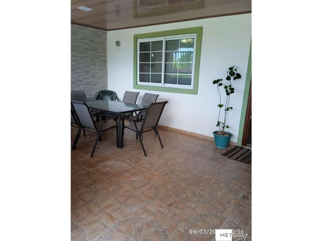 Open-concept tiled living and dining room in Altos del Crisol Villa Lucre Panama
